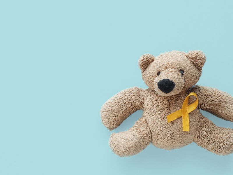 bamse med gullsløyfe